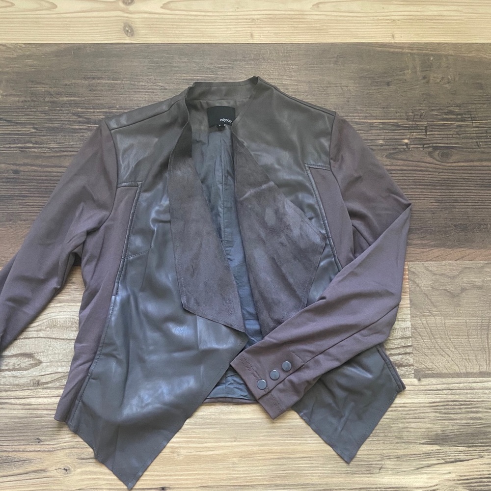 Mixed materials asymmetrical jacket
